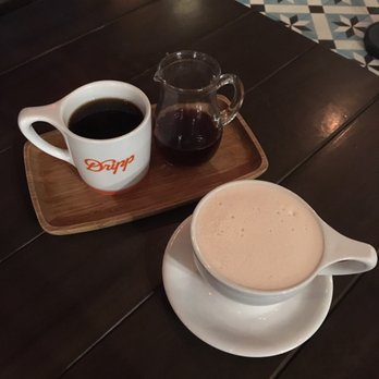 Dripp - The Konga coffee (left) and an Athena-T tea latte (right)! - Coffee & Tea Near Me - Fullerton, California Dripp - The Konga coffee (left) and an Athena-T tea latte (right)! - Coffee & Tea Near Me - Fullerton, California