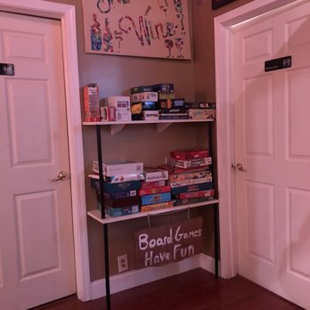 Wine on Hertel - Games in between the two rest rooms. - Bars Near Me - Buffalo, New York