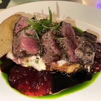 The Drake - Venison loin, poached pear, on top of mashed potatoes in lingonberry sauce. - Bars Near Me - Laguna Beach, California The Drake - Venison loin, poached pear, on top of mashed potatoes in lingonberry sauce. - Bars Near Me - Laguna Beach, California