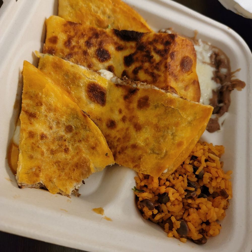 Birria quesadilla plate. Birria quesadilla plate.