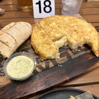100 Montaditos - Spanish tortilla served with warms bread and a garlic sauce. - Sandwiches Near Me - Miami, Florida