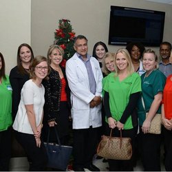 Midway Specialty Care Center - our entire team celebrating a lifetime acheivement award for Dr. Ramgopal
