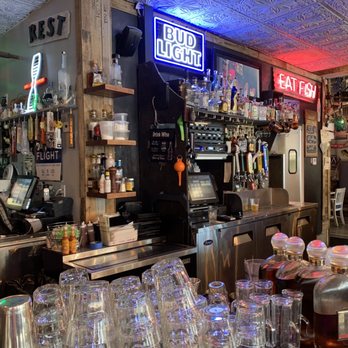 Tin Fish - a bar with a lot of empty glasses - New American Near Me - Sunrise, Florida Tin Fish - a bar with a lot of empty glasses - New American Near Me - Sunrise, Florida