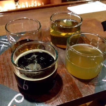 Railhead Brewing Company - Beer Flight with some beer missing - Pizza Near Me - Hornell, New York Railhead Brewing Company - Beer Flight with some beer missing - Pizza Near Me - Hornell, New York