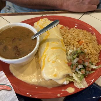 Cabos Bonitos Grill & Cantina - Chicken burrito with queso and drunken beans. - Mexican Near Me - Springfield, Missouri Cabos Bonitos Grill & Cantina - Chicken burrito with queso and drunken beans. - Mexican Near Me - Springfield, Missouri
