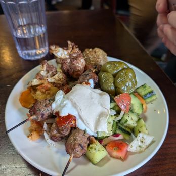Ali Baba Mediterranean Grill - Roasted cauliflower, gyro, tzatziki, stuffed peppers, cucumber salad, kafta skewer, sauteed vegetables - Mediterranean Near Me - Richardson, Texas