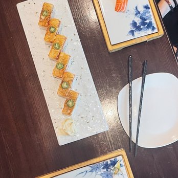 Miku - Salmon oshi and pieces of yellowtail and salmon nigiri - Japanese Near Me - Vancouver, British Columbia