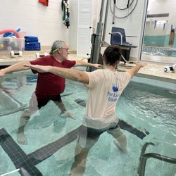 Next Level Rehab - Our client is working on balance and gaining strength in the pool.