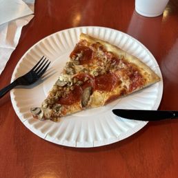 Sausage, pepperoni, and mushroom pizza