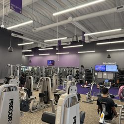 Anytime Fitness - Pin loaded strength equipment for upper and lower body and free weight area.