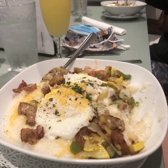 Home Plate - Shrimp and grits with veggies and poached eggs - American Near Me - Dunedin, Florida Home Plate - Shrimp and grits with veggies and poached eggs - American Near Me - Dunedin, Florida