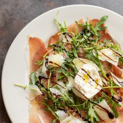 Speck Pizza + Street Food - Wait, what is "speck"? It's smoked Italian prosciutto, and it's the name behind our restaurant. You'll find it on our Speck Signature.
