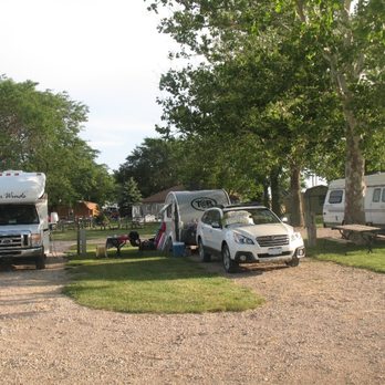 Grand Island KOA - narrow strip of grass between - Campgrounds Near Me - Doniphan, Nebraska