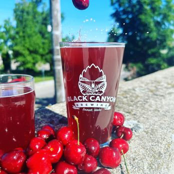 Black Canyon Taphouse - a pint of cherry juice and cherries - Breweries Near Me - Emmett, Idaho Black Canyon Taphouse - a pint of cherry juice and cherries - Breweries Near Me - Emmett, Idaho