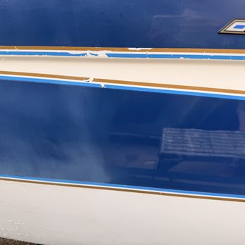 Imperium Mobile Auto Detailing - Left side is oxidized paint on a 35 year old boat. Right side is where the began to detail. - Auto Detailing Near Me Imperium Mobile Auto Detailing - Left side is oxidized paint on a 35 year old boat. Right side is where the began to detail. - Auto Detailing Near Me