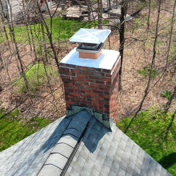Supreme Brick & Chimney - Relined chimney with a stainless-steel liner then coated the crown with an elastomeric rubber coating. - Chimney Sweeps Near Me Supreme Brick & Chimney - Relined chimney with a stainless-steel liner then coated the crown with an elastomeric rubber coating. - Chimney Sweeps Near Me