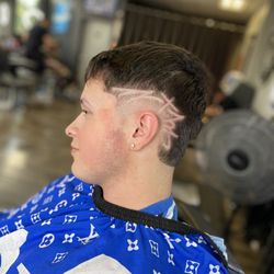 Major Leagues Barbershop - Mid burst fade with design by Chucky