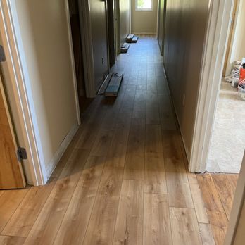 James Goodenow - Laying Flooring after painting walls - Handyman Near Me - Lewiston, Maine