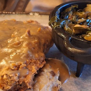 Dumbwaiter Restaurant - Fried porkchop collard greens and mash potatoes - Southern Near Me - Mobile, Alabama