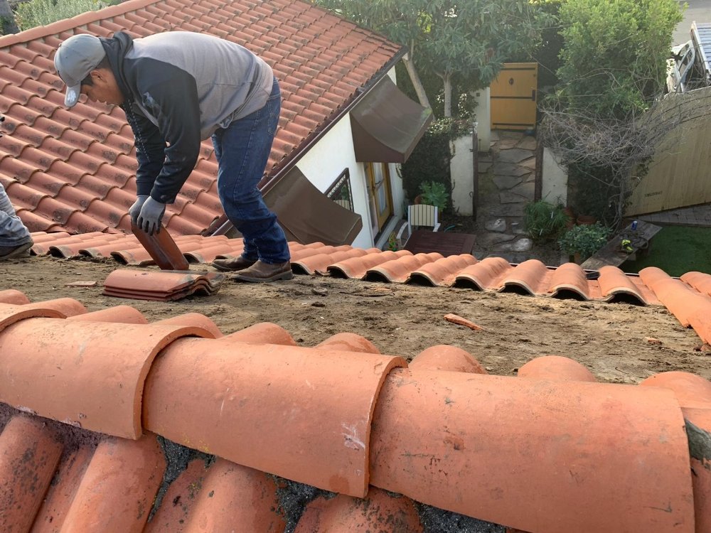 Slide of The Local Roofers and Builders