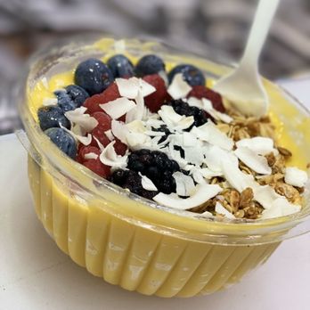 Juice Up - Mango bowl: frozen mango blended with pineapple and banana topped with blueberries,raspberries blackberries,granolas and coconut flakes. - Juice Bars & Smoothies Near Me - Bronx, New York Juice Up - Mango bowl: frozen mango blended with pineapple and banana topped with blueberries,raspberries blackberries,granolas and coconut flakes. - Juice Bars & Smoothies Near Me - Bronx, New York