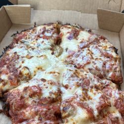 Chicago's Pizza - Deep dish with tomato, mushroom, and red onion