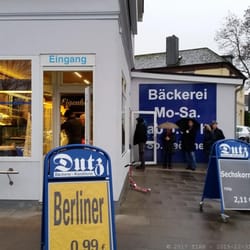 Bäcker Dutz - Stoßzeit bei Dutz - bei viel Andrang gibt es die Bypass Lösung. Hinten rein, bedient werden, Zahlen und vorne raus.