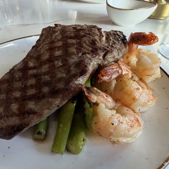 Bow & Stern - Surf and turf dinner with the 10oz steak and three prawns - Seafood Near Me - Burnaby, British Columbia
