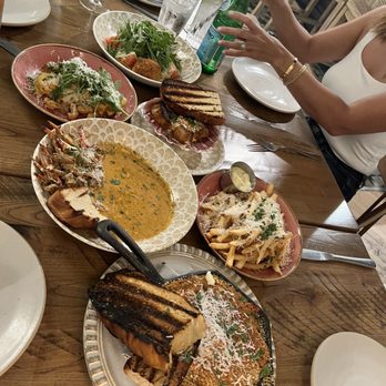 Thorny Oyster - Oyster Special, Crab claws, Scallops, Truffle Flaws, Tomato Salad and Crawfish Bread - New American Near Me - Bay St. Louis, Mississippi
