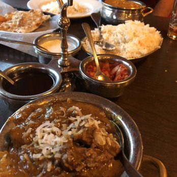 Mughal Palace - a plate of food on a table - Indian Near Me - Chelsea, Maine Mughal Palace - a plate of food on a table - Indian Near Me - Chelsea, Maine