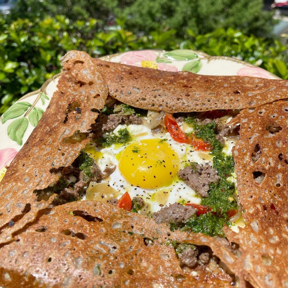Whisk Crepes Cafe - a plate of food - Creperies Near Me - Houston, Texas Whisk Crepes Cafe - a plate of food - Creperies Near Me - Houston, Texas