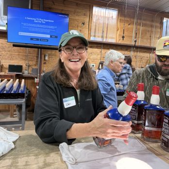 Garrison Brothers Distillery - Quality inspection at the end of dipping. Looked for imperfections in the wax, the signature Star imprint on top, and a clear bourbon - Distilleries Near Me - Hye, Texas Garrison Brothers Distillery - Quality inspection at the end of dipping. Looked for imperfections in the wax, the signature Star imprint on top, and a clear bourbon - Distilleries Near Me - Hye, Texas