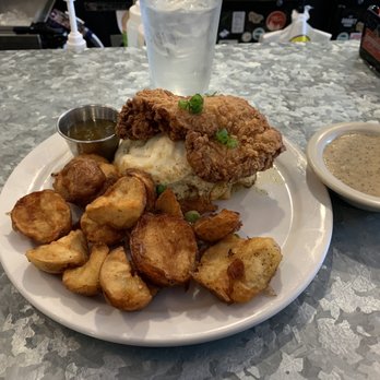 Phoebe's Diner - Chicken biscuit with a side of sausage gravy - Breakfast & Brunch Near Me - Austin, Texas Phoebe's Diner - Chicken biscuit with a side of sausage gravy - Breakfast & Brunch Near Me - Austin, Texas
