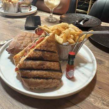 Ikaro - Egg sandwich with a hot sauce bottle - Breakfast & Brunch Near Me - Middletown, New York