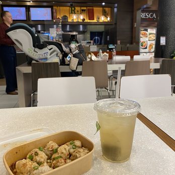 Rolling Dumpling - Spicy shrimp and pork wontons in chili sauce Iced jasmine green tea - Dim Sum Near Me - San Francisco, California