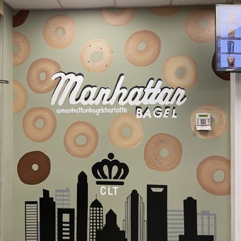 Manhattan Bagel - Local artist work showing the clt skyline and bagels! @artbymollyk - Breakfast & Brunch Near Me - Charlotte, North Carolina Manhattan Bagel - Local artist work showing the clt skyline and bagels! @artbymollyk - Breakfast & Brunch Near Me - Charlotte, North Carolina