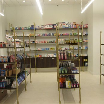 Cedra Pharmacy - Check out the boxes of unpacked merchandise.  Racks of merchandise inside Cedra Pharmacy on the Upper Westside Dec. 2016 - Pharmacy Near Me - New York, New York
