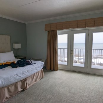 Cherry Tree Inn & Suites - Really large bedroom with a nice view of the water - Hotels Near Me - Traverse City, Michigan Cherry Tree Inn & Suites - Really large bedroom with a nice view of the water - Hotels Near Me - Traverse City, Michigan