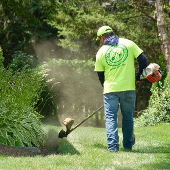 TGF Enterprises - a man using a leaf blower - Landscaping Near Me - Libertyville, Illinois TGF Enterprises - a man using a leaf blower - Landscaping Near Me - Libertyville, Illinois