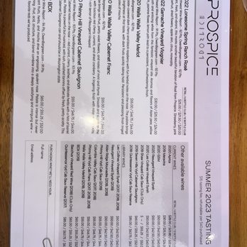 Prospice Wines - a menu on a wooden table - Wineries Near Me - Walla Walla, Washington Prospice Wines - a menu on a wooden table - Wineries Near Me - Walla Walla, Washington