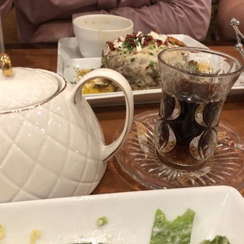 Zara's Mediterranean Kitchen - Tea and in the back some kind of eggplant dish. Very delish! - Halal Near Me - Spring, Texas Zara's Mediterranean Kitchen - Tea and in the back some kind of eggplant dish. Very delish! - Halal Near Me - Spring, Texas