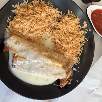 Plaza Azteca - Chicken Chimichanga with queso, no sour cream nor beans! Delicious - Mexican Near Me - Fargo, North Dakota Plaza Azteca - Chicken Chimichanga with queso, no sour cream nor beans! Delicious - Mexican Near Me - Fargo, North Dakota