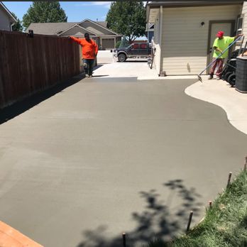 TL Contractors - a concrete driveway being poured - Masonry/Concrete Near Me