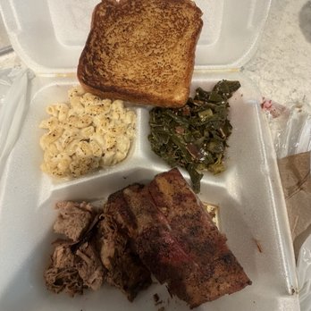 MF Bbq - A two-meat combo plate. This is a baby back rib and 1 slice of brisket chopped up. A meal fit for a toddler. - Food Trucks Near Me - Riverview, Florida