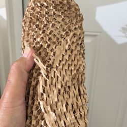 Sip Tequila - Example of individual bottle wrapping for shipment. Bottles are then further separated by additional thick, wrapping to keep separated inbox
