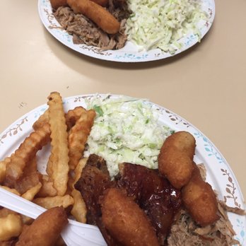 Ken's Grill - Pork BBQ platters; one with fries, one with potato salad, both with coleslaw - Barbeque Near Me - La Grange, North Carolina