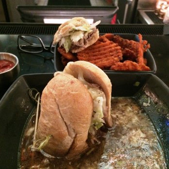 Little Fib - Shaved beef with coleslaw french dip sauce and sweet potato waffle fries - Southern Near Me - Nashville, Tennessee Little Fib - Shaved beef with coleslaw french dip sauce and sweet potato waffle fries - Southern Near Me - Nashville, Tennessee