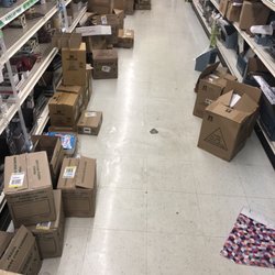 Dollar Tree - One of the many isles of unboxed stuff.  Am I supposed to search through the boxes for stuff I need?