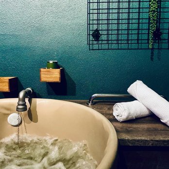 Oakwell Beer Spa - Tub with ratio hops and barley - Day Spas Near Me - Denver, Colorado Oakwell Beer Spa - Tub with ratio hops and barley - Day Spas Near Me - Denver, Colorado