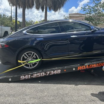 Jorg & Day Towing - Putting my vehicle into the flat bed and securing it. - Towing Near Me - Sarasota, Florida Jorg & Day Towing - Putting my vehicle into the flat bed and securing it. - Towing Near Me - Sarasota, Florida
